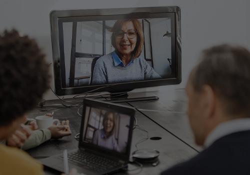 Group in Conference Room on Webinar