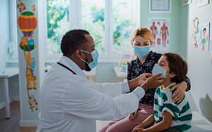 Doctor Treating Child