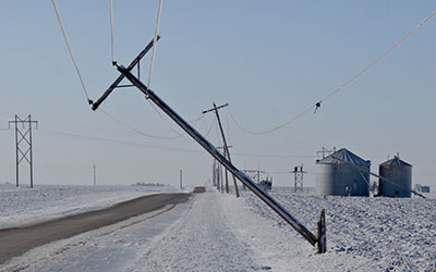 Power Lines Down on Winter Road
