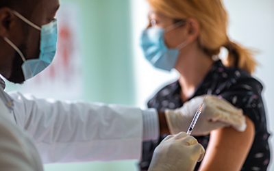 HHS Issues FAQs on HIPAA Privacy & COVID-19 or Flu Vaccine Status