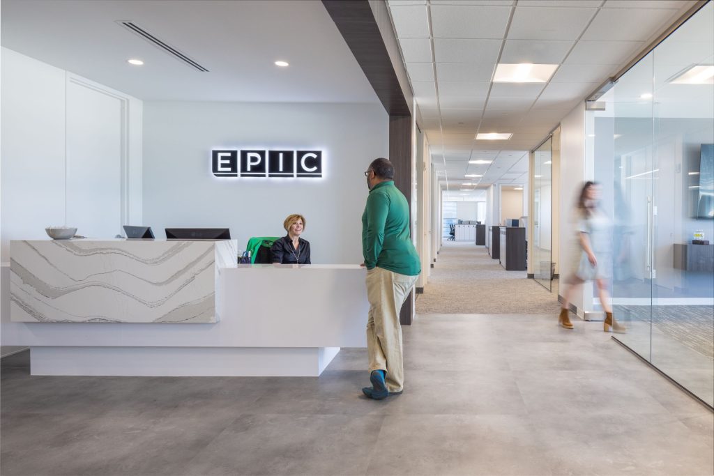 lobby of EPIC office with man talking to receptionist