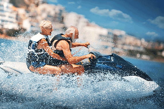 elderly couple jet skiing