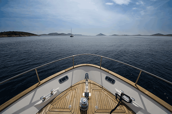 View of open water from bow of yacht