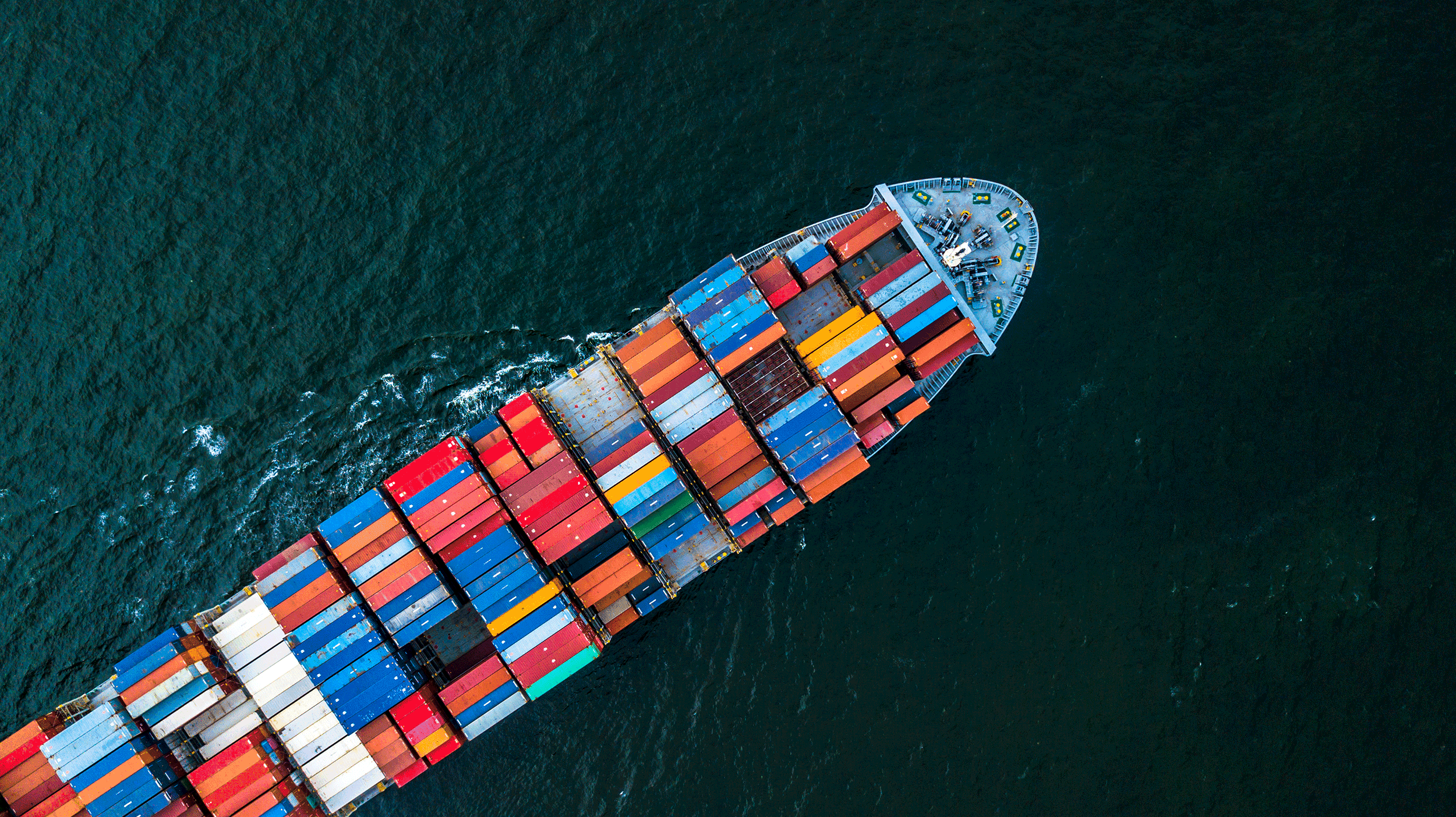 overhead view of cargo ship on the ocean