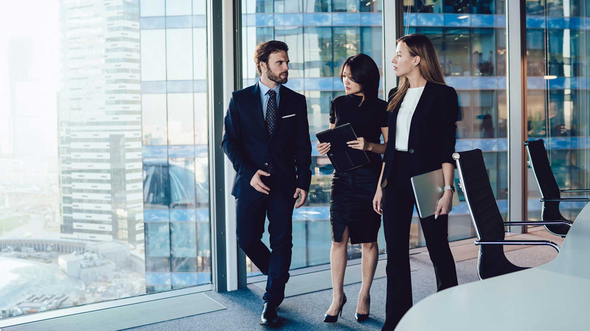 group of professionals walking and talking
