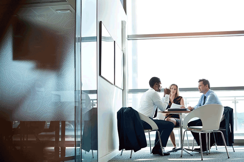 business people talking at table