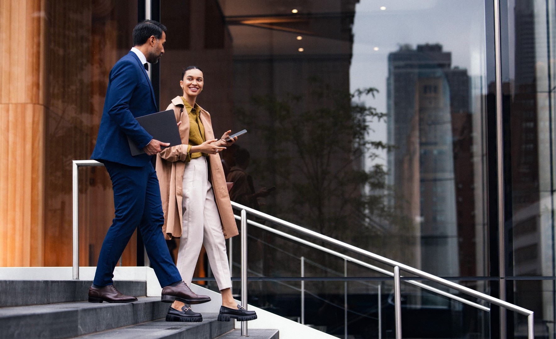 business professionals walking down steps