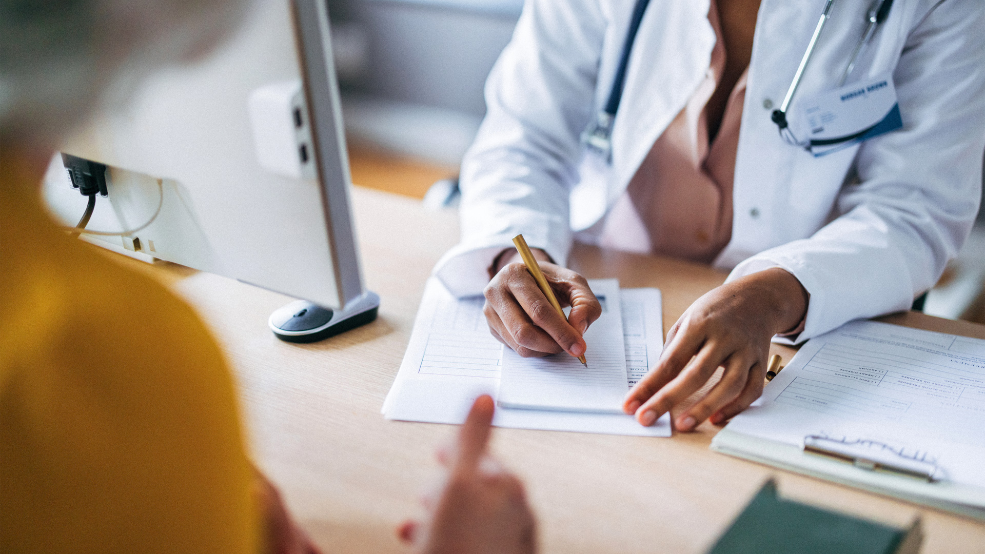 medical professional writing notes