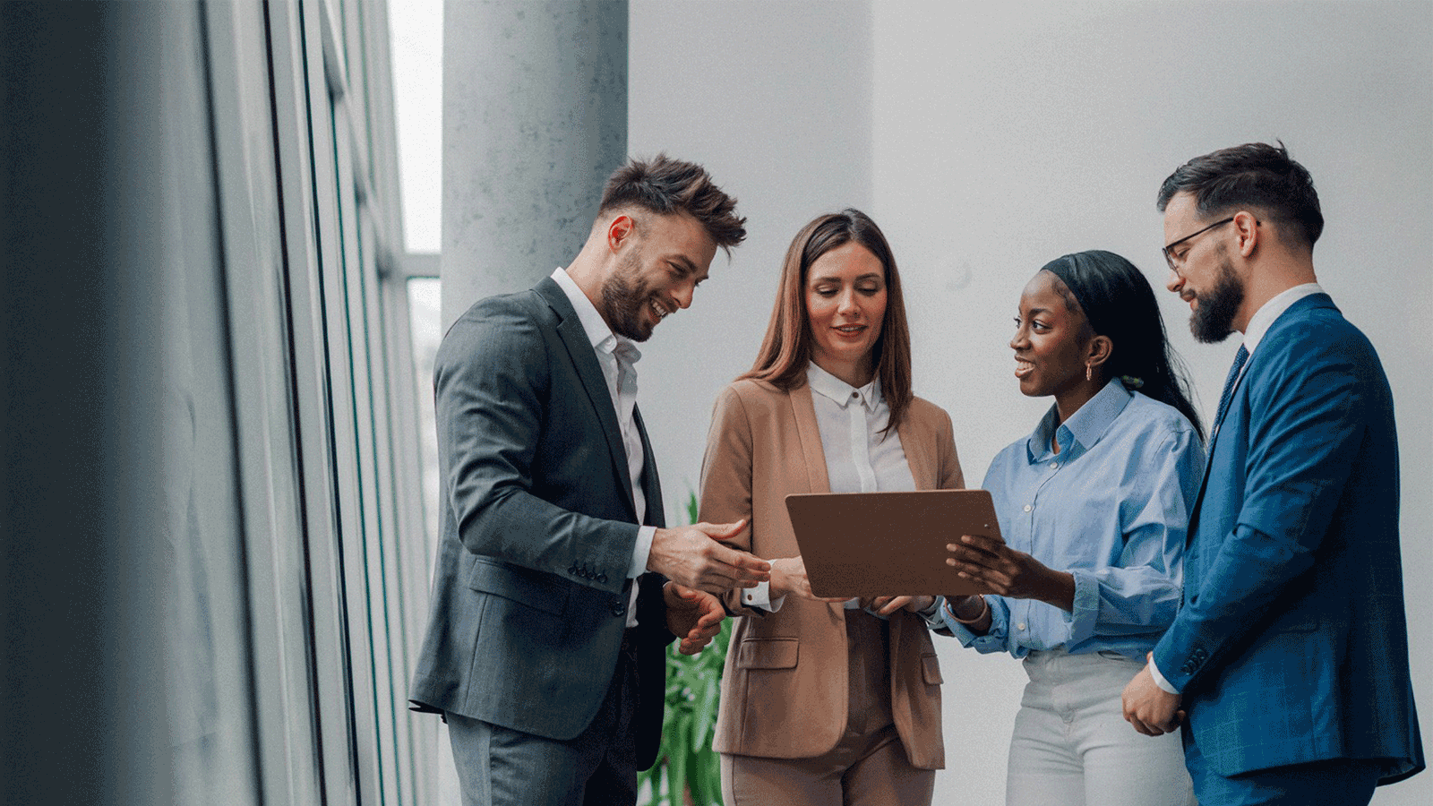 diverse group of business professionals standing